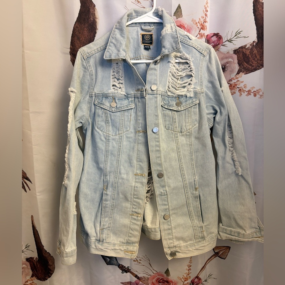 Medium Distressed Light Blue Denim Jacket​​